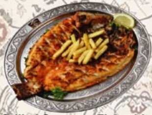 سمك مشوي خاص مع بطاطس