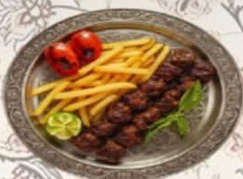 تكة لحم باللبن مع بطاطا مقلية
